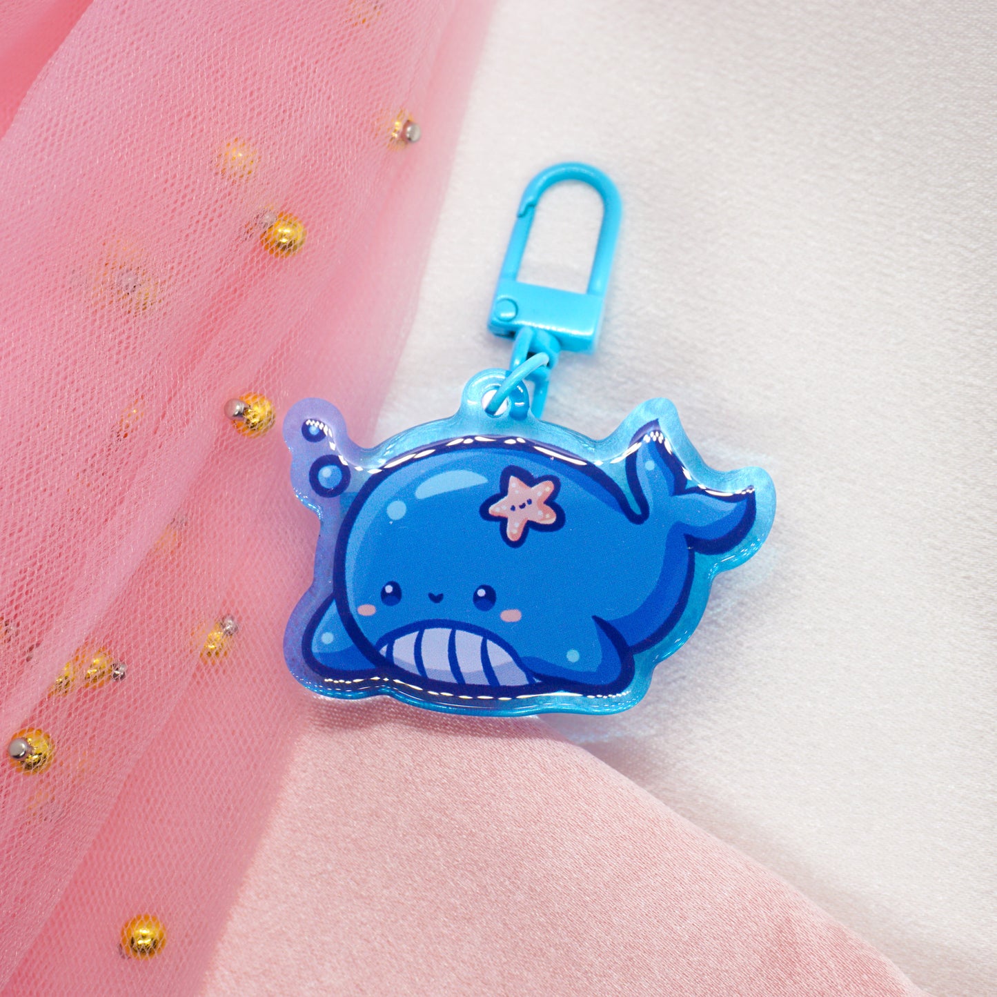Kawaii whale with starfish keychain