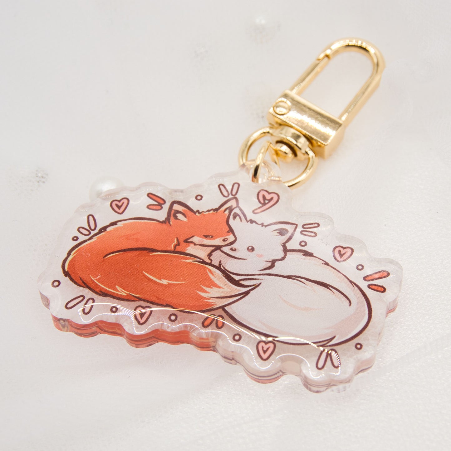 Kawaii fox with butterfly keychain