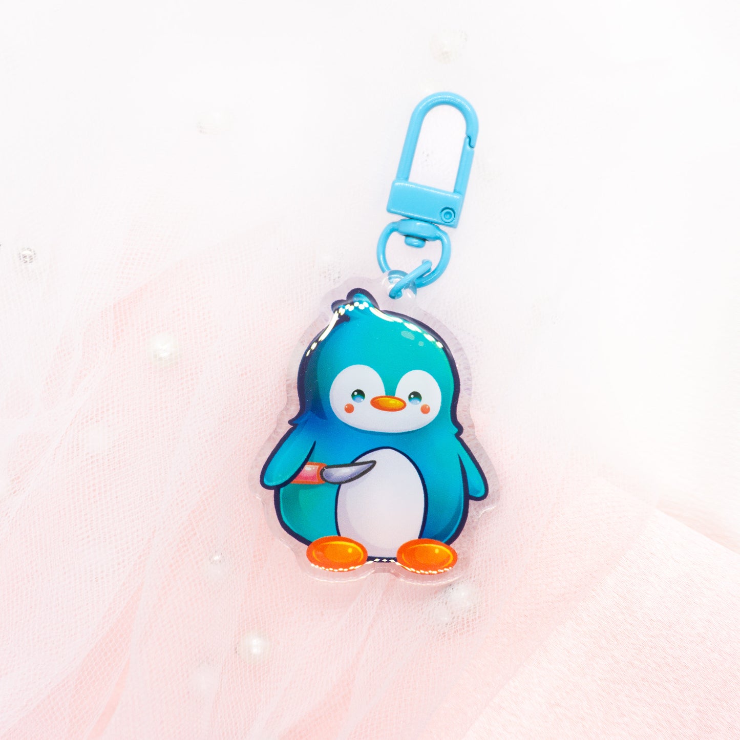 Kawaii turquoise penguin with knife keychain