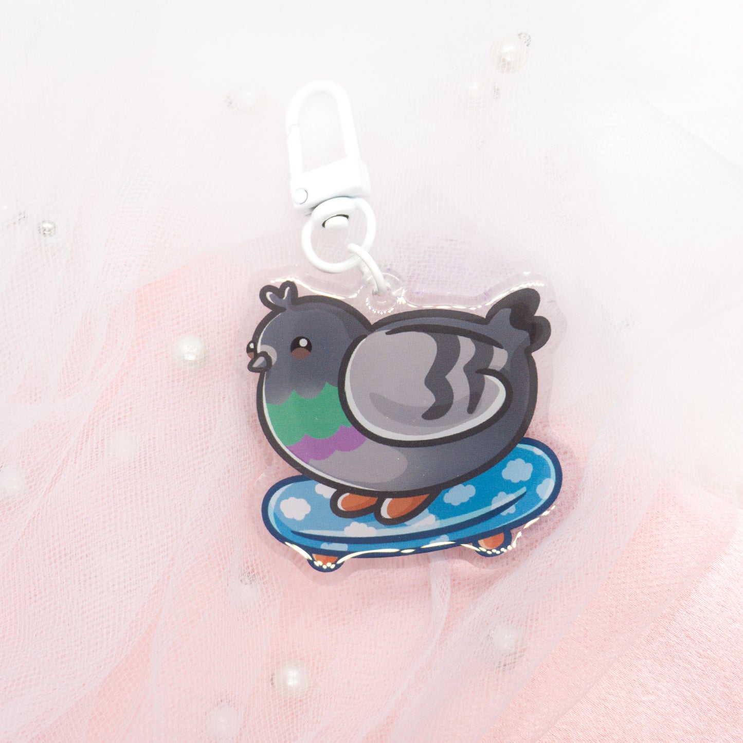 Kawaii pigeon with magic wand or skateboard keychain