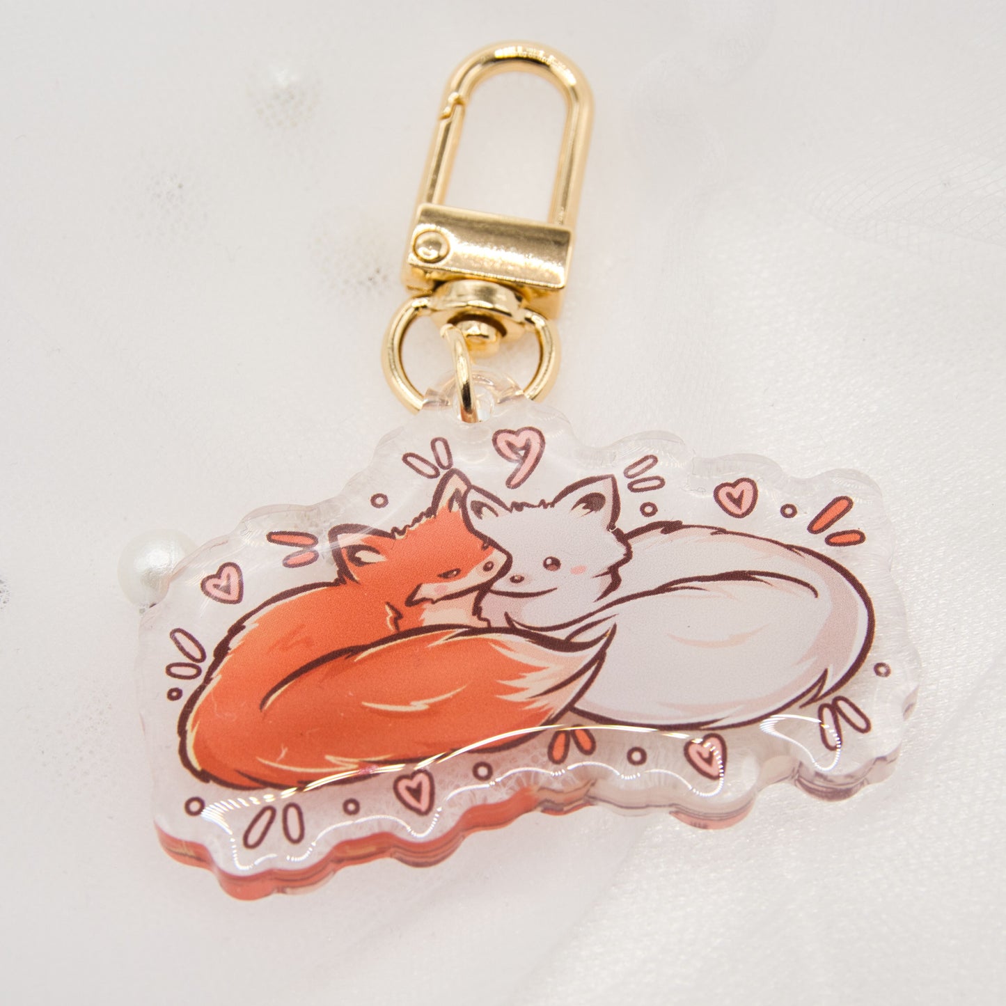 Kawaii fox with butterfly keychain